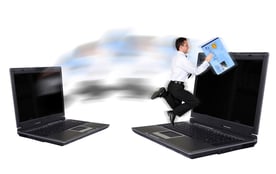 online credit card fraud - businessman stealing a credit card online - credit card design is my own and numbers are made up